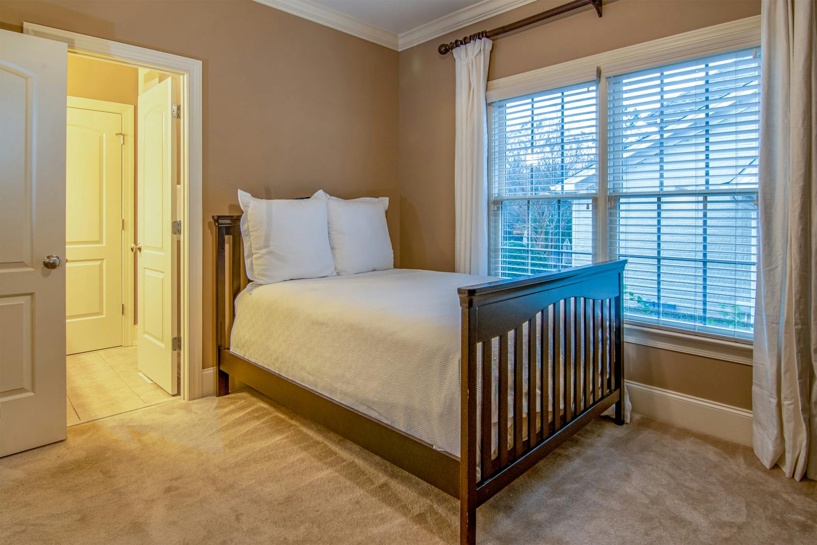 Brown Wooden Bed Inside Bedroom